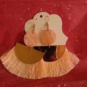 Beautiful pink tassle earrings